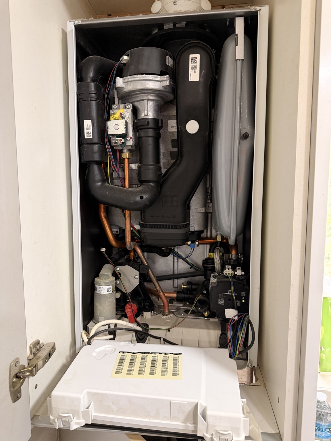 Vaillant boiler with its casing removed during inspection