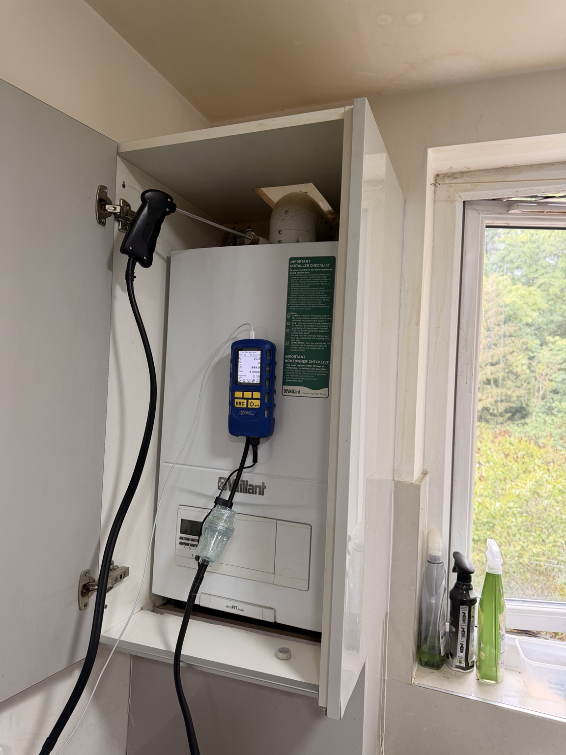 Vaillant boiler with a flue-gas analyser connected during an inspection
