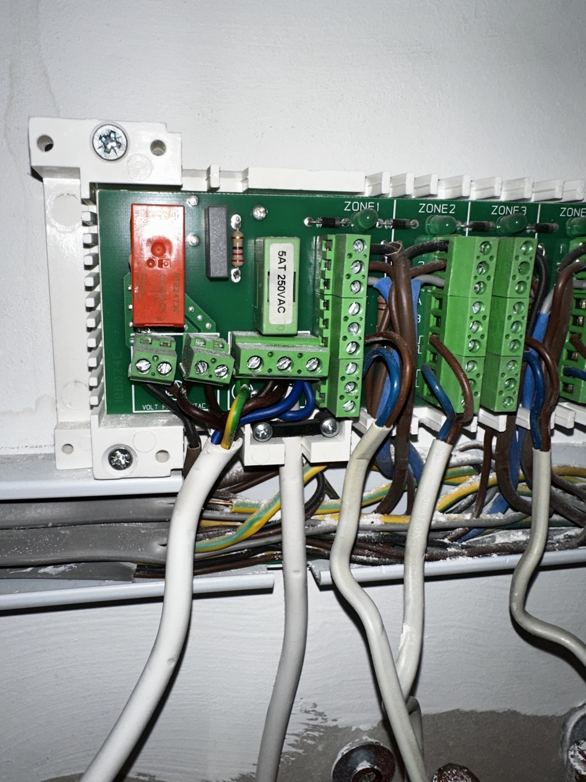 Open underfloor-heating wiring centre during repair