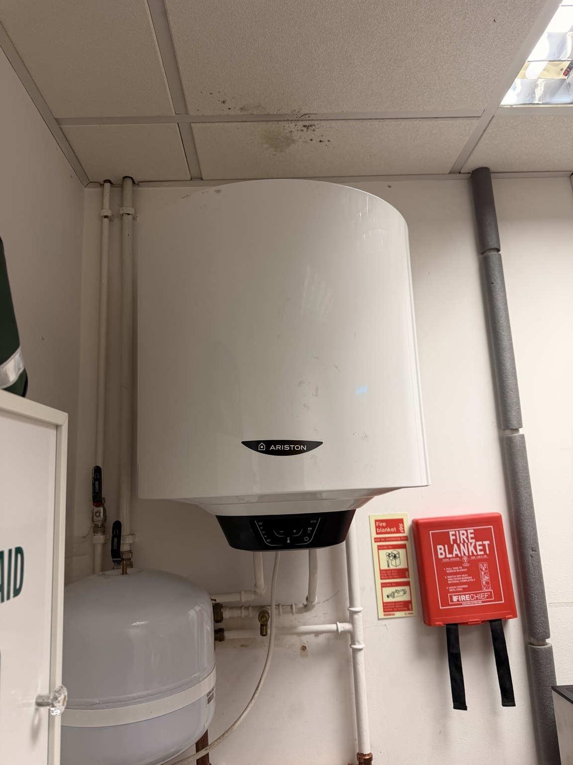 Replacement Ariston electric storage water heater mounted on the wall